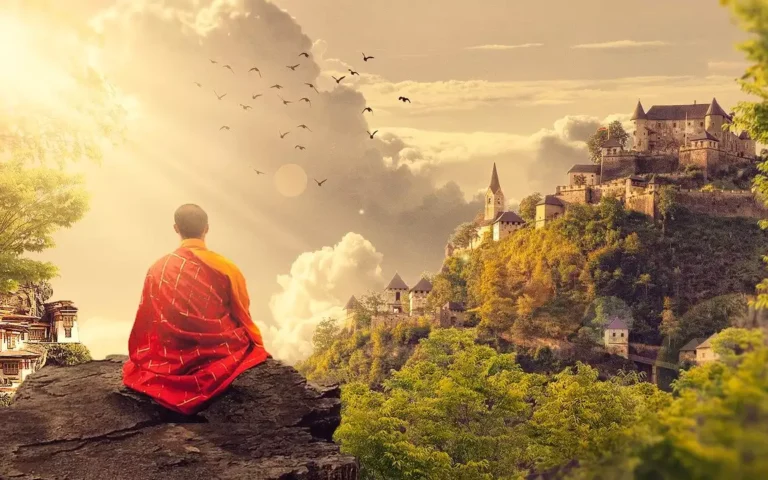 Buddhist monk in traditional robes sits cross-legged in meditation pose on a stone outcrop, with a distant temple creating a serene spiritual landscape.